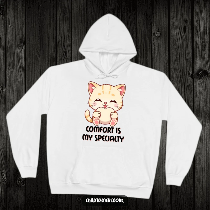 Funny kitten hugging a soft comfort object on a warm hoodie, embodying comfort and sweetness.